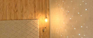 Hotelzimmer mit Wema-Wanddesign inkl. LED gestaltet, Putz aus Baumwolle, Wohngesundheit mit vielen Vorteilen. Es gibt 150 Designs und sind kombinierbar.
